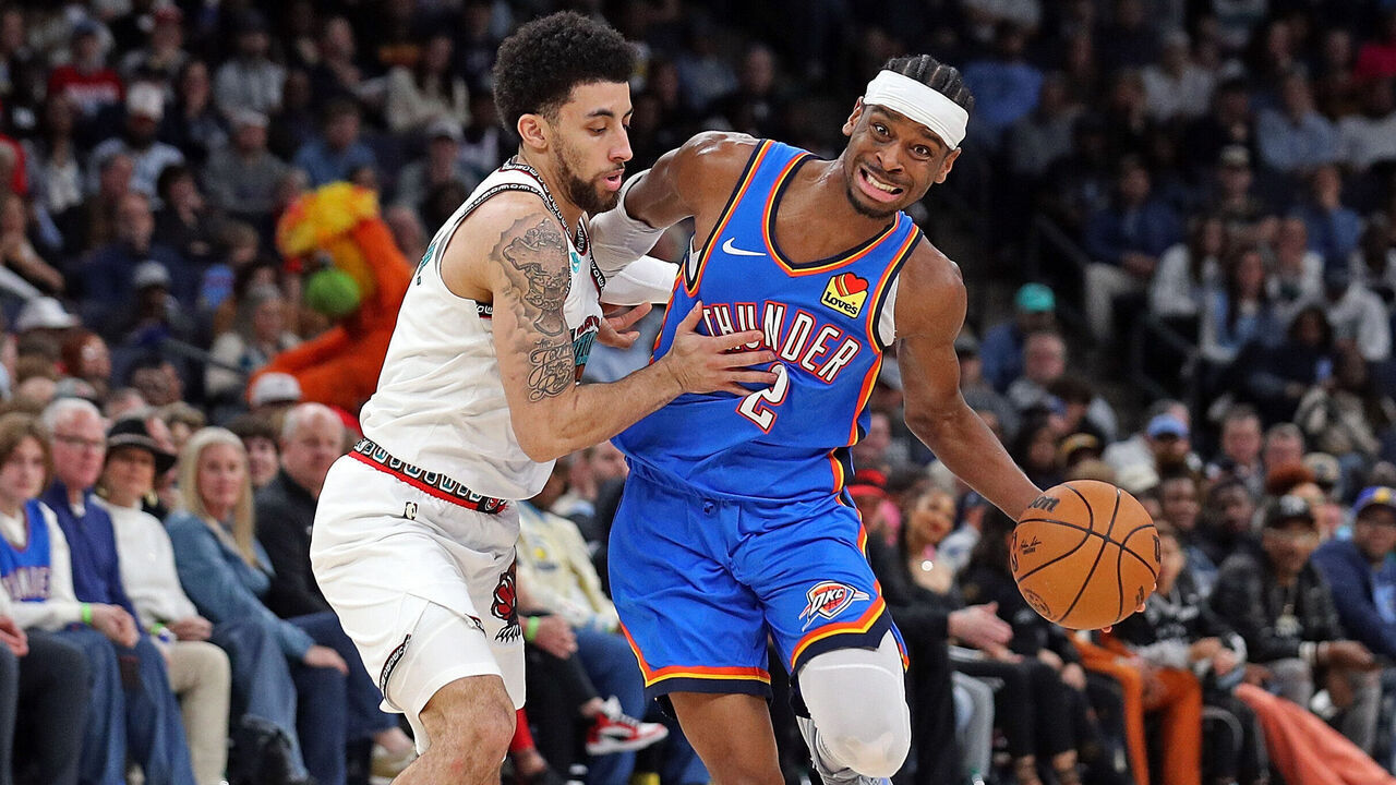 MEMPHIS, TENNESSEE - FEBRUARY 08: Shai Gilgeous-Alexander #2 of the Oklahoma City Thunder handles the ball against Scotty Pippen Jr. #1 of the Memphis Grizzlies during the second half at FedExForum on February 08, 2025 in Memphis, Tennessee.