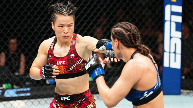 SYDNEY, AUSTRALIA - FEBRUARY 09: (L-R) Zhang Weili of China battles Tatiana Suarez in the UFC strawweight championship fight during the UFC 312 event at Qudos Bank Arena on February 09, 2025 in Sydney, Australia.