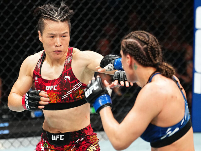 SYDNEY, AUSTRALIA - FEBRUARY 09: (L-R) Zhang Weili of China battles Tatiana Suarez in the UFC strawweight championship fight during the UFC 312 event at Qudos Bank Arena on February 09, 2025 in Sydney, Australia.