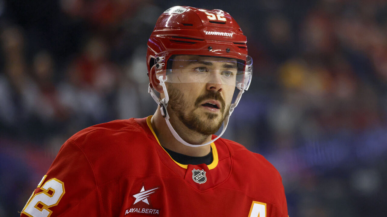 CALGARY, CANADA - FEBRUARY 04: MacKenzie Weegar #52 of the Calgary Flames prepares for a face-off against the Toronto Maple Leafs at the Scotiabank Saddledome on February 04, 2025, in Calgary, Alberta, Canada.