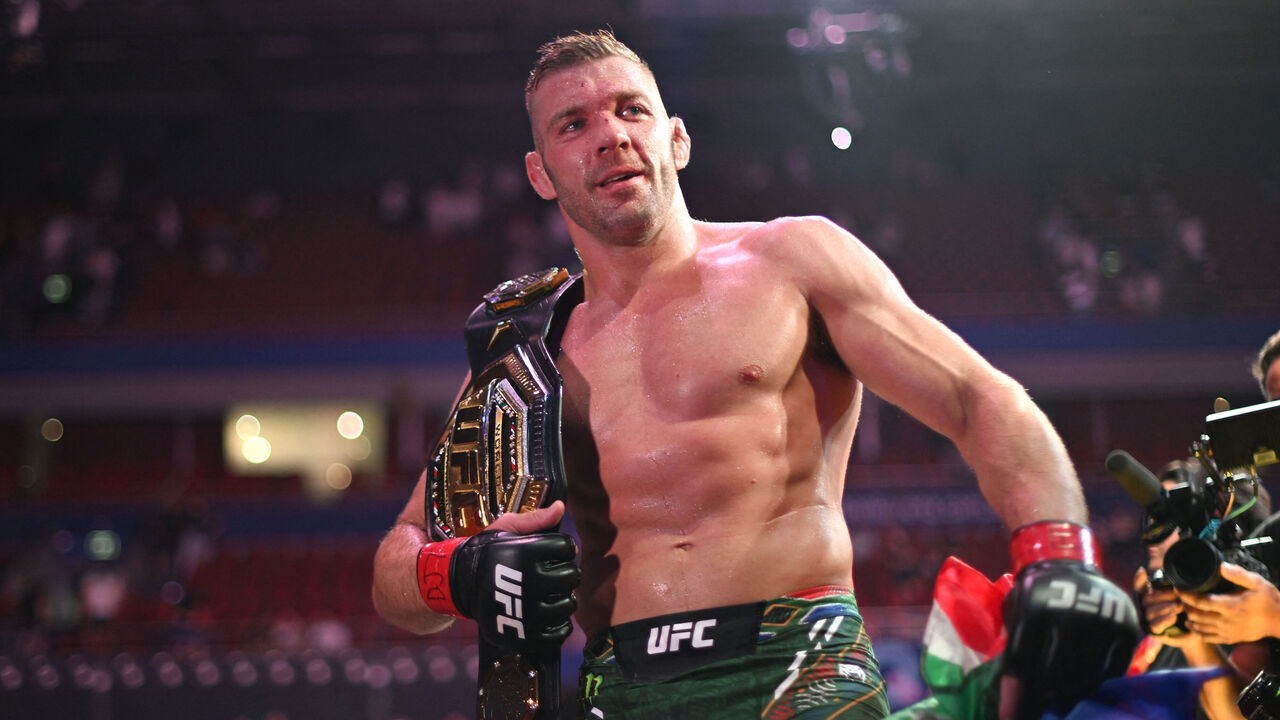South Africa's Dricus du Plessis celebrates his victory over Sean Strickland of the US after their men's middleweight division event of the Ultimate Fighting Championship (UFC) 312 at Qudos Bank Arena in Sydney on February 9, 2025.