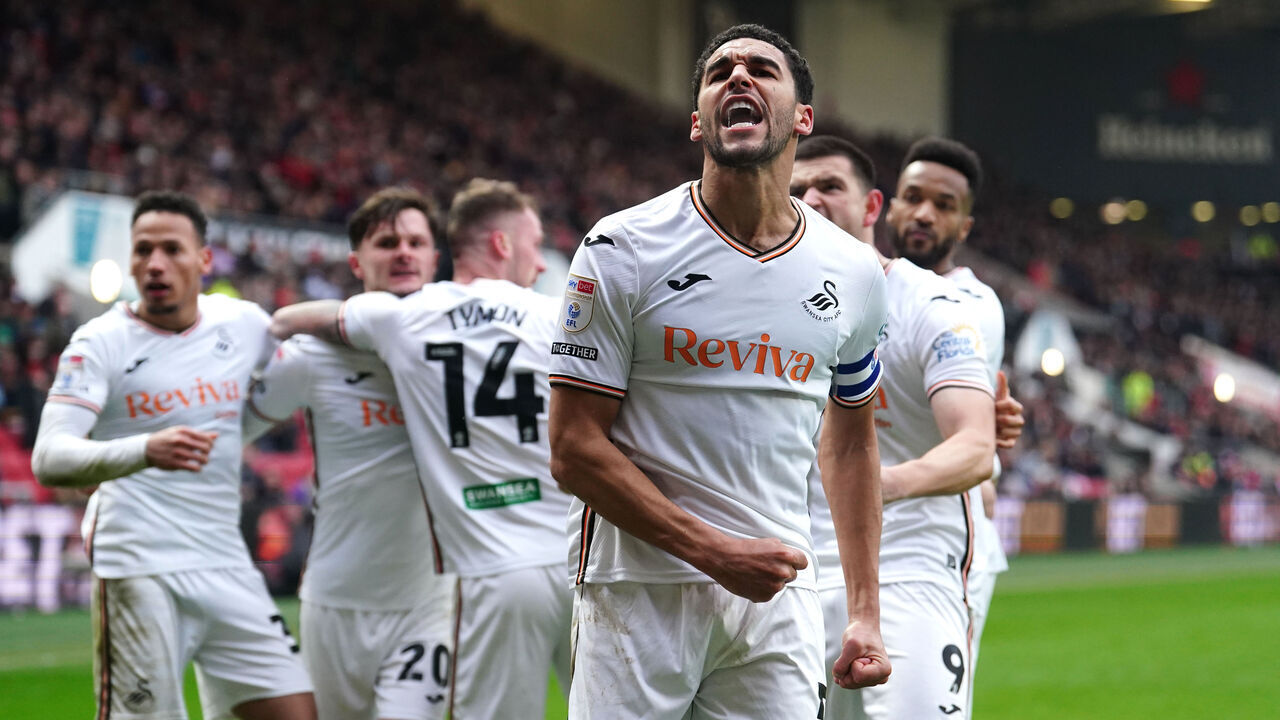 Swansea City's Ben Cabango celebrates after team-mate Josh Tymon scores their first goal of the game during the Sky Bet Championship match at Ashton Gate Stadium, Bristol. Picture date: Sunday February 9, 2025.