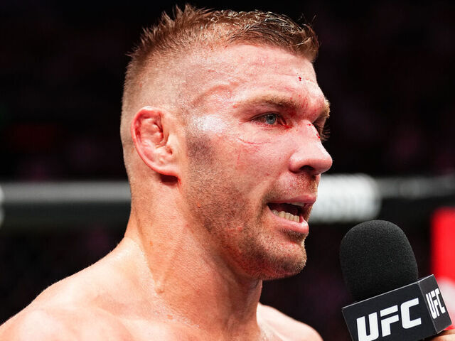SYDNEY, AUSTRALIA - FEBRUARY 09: Dricus Du Plessis of South Africa reacts after a unanimous-decision victory against Sean Strickland in the UFC middleweight championship fight during the UFC 312 event at Qudos Bank Arena on February 09, 2025 in Sydney, Australia.
