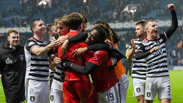 GLASGOW, SCOTLAND - FEBRUARY 09: Queen;s Park players celebrate with Calum Ferrie at full time during a Scottish Gas Men's Scottish Cup match between Rangers and Queen's Park at Ibrox Stadium, on February 09, 2025, in Glasgow, Scotland.