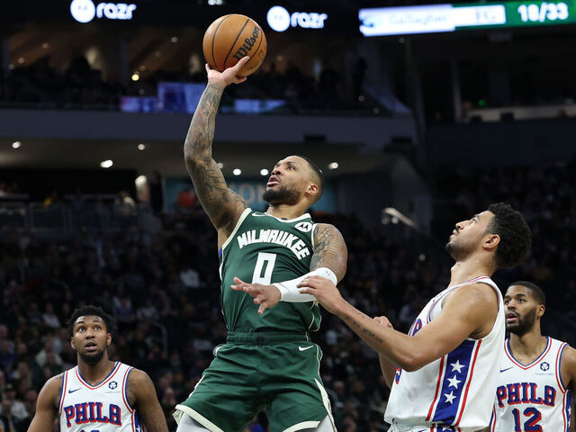 MILWAUKEE, WISCONSIN - FEBRUARY 09: Damian Lillard #0 of the Milwaukee Bucks drives to the basket during the first half of a game against the Philadelphia 76ers at Fiserv Forum on February 09, 2025 in Milwaukee, Wisconsin.