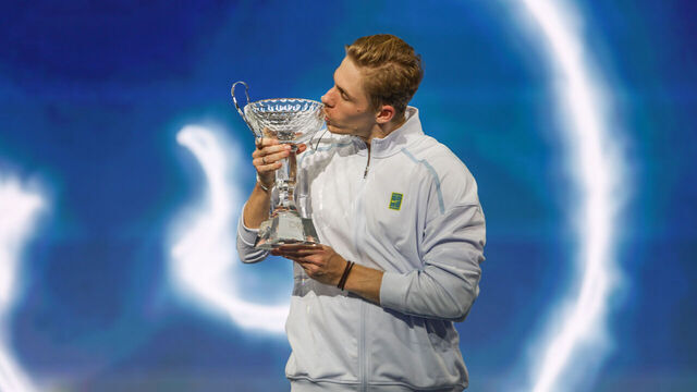 FRISCO, TX - FEBRUARY 09: Denis Shapovalov (CAN) kisses the trophy after winning the Dallas Open on February 9, 2025 at Ford Center at The Star in Frisco, TX.