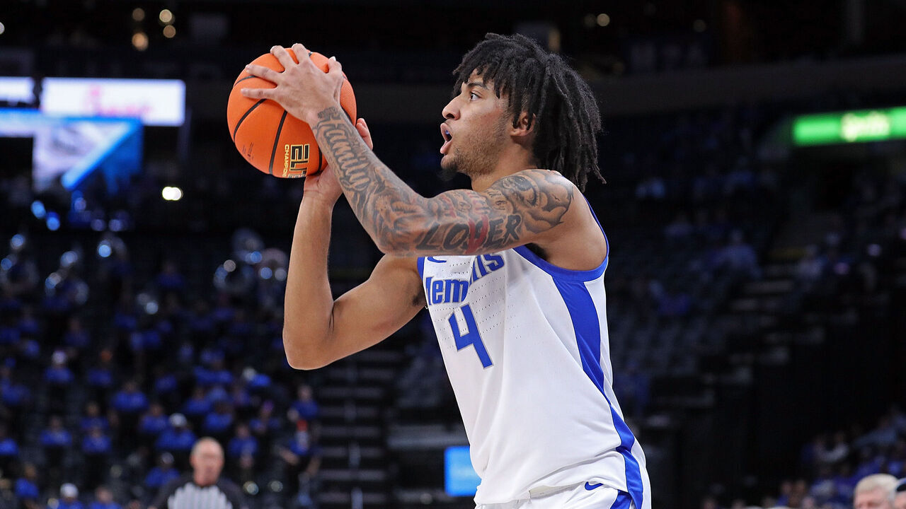 MEMPHIS, TENNESSEE - FEBRUARY 09: PJ Haggerty #4 of the Memphis Tigers takes a shot during the first half against the Temple Owls at FedExForum on February 09, 2025 in Memphis, Tennessee.