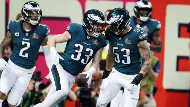 NEW ORLEANS, LOUISIANA - FEBRUARY 09: Cooper DeJean #33 of the Philadelphia Eagles celebrates an interception returned for a touchdown with Zack Baun #53 in the second quarter against the Kansas City Chiefs during Super Bowl LIX at Caesars Superdome on February 09, 2025 in New Orleans, Louisiana.
