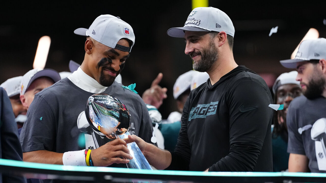 NEW ORLEANS, LA - FEBRUARY 09: Jalen Hurts #1 of the Philadelphia Eagles and head coach Nick Sirianni celebrate with the Lombardi Trophy after defeating the Kansas City Chiefs during Super Bowl LIX at Caesars Superdome on February 9, 2025 in New Orleans, Louisiana.