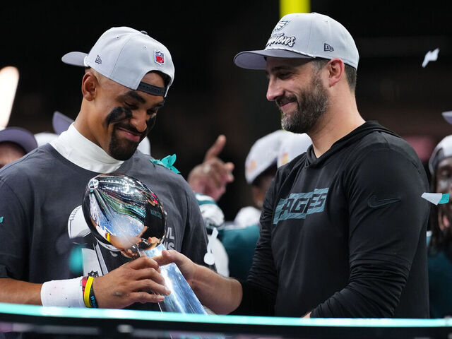 NEW ORLEANS, LA - FEBRUARY 09: Jalen Hurts #1 of the Philadelphia Eagles and head coach Nick Sirianni celebrate with the Lombardi Trophy after defeating the Kansas City Chiefs during Super Bowl LIX at Caesars Superdome on February 9, 2025 in New Orleans, Louisiana.