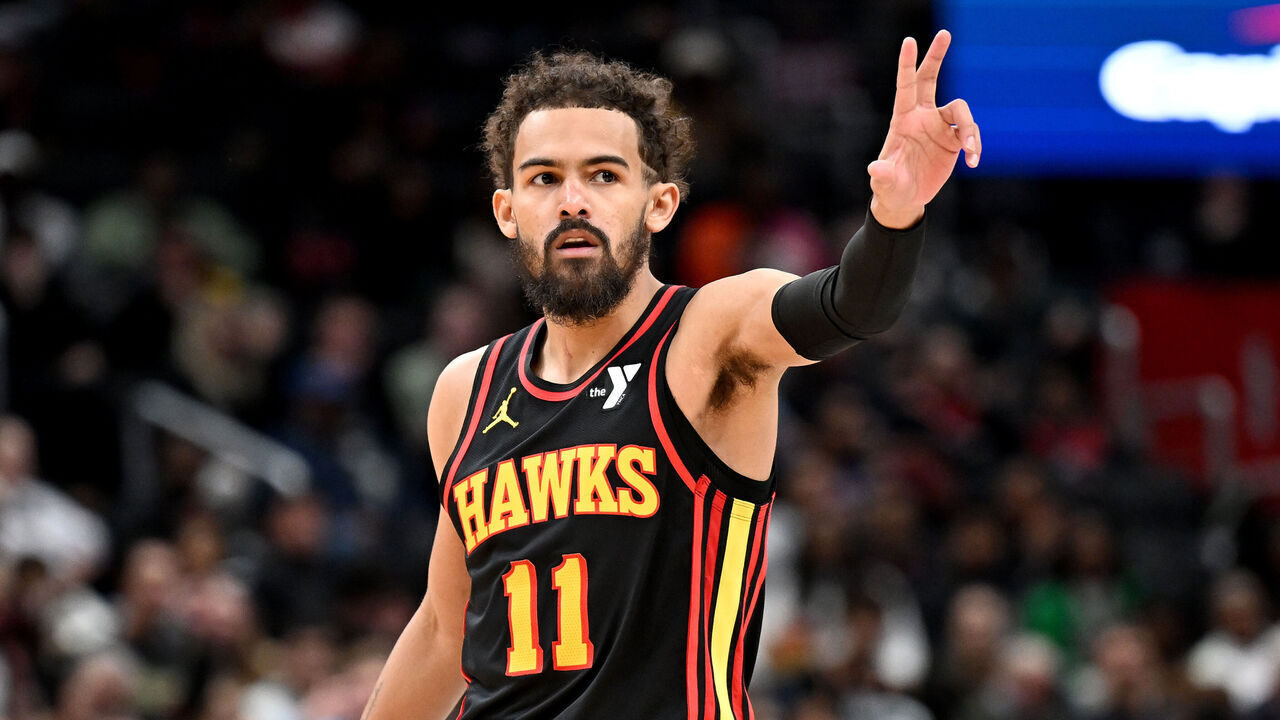WASHINGTON, DC - FEBRUARY 08: Trae Young #11 of the Atlanta Hawks celebrates in the third quarter against the Washington Wizards at Capital One Arena on February 08, 2025 in Washington, DC.