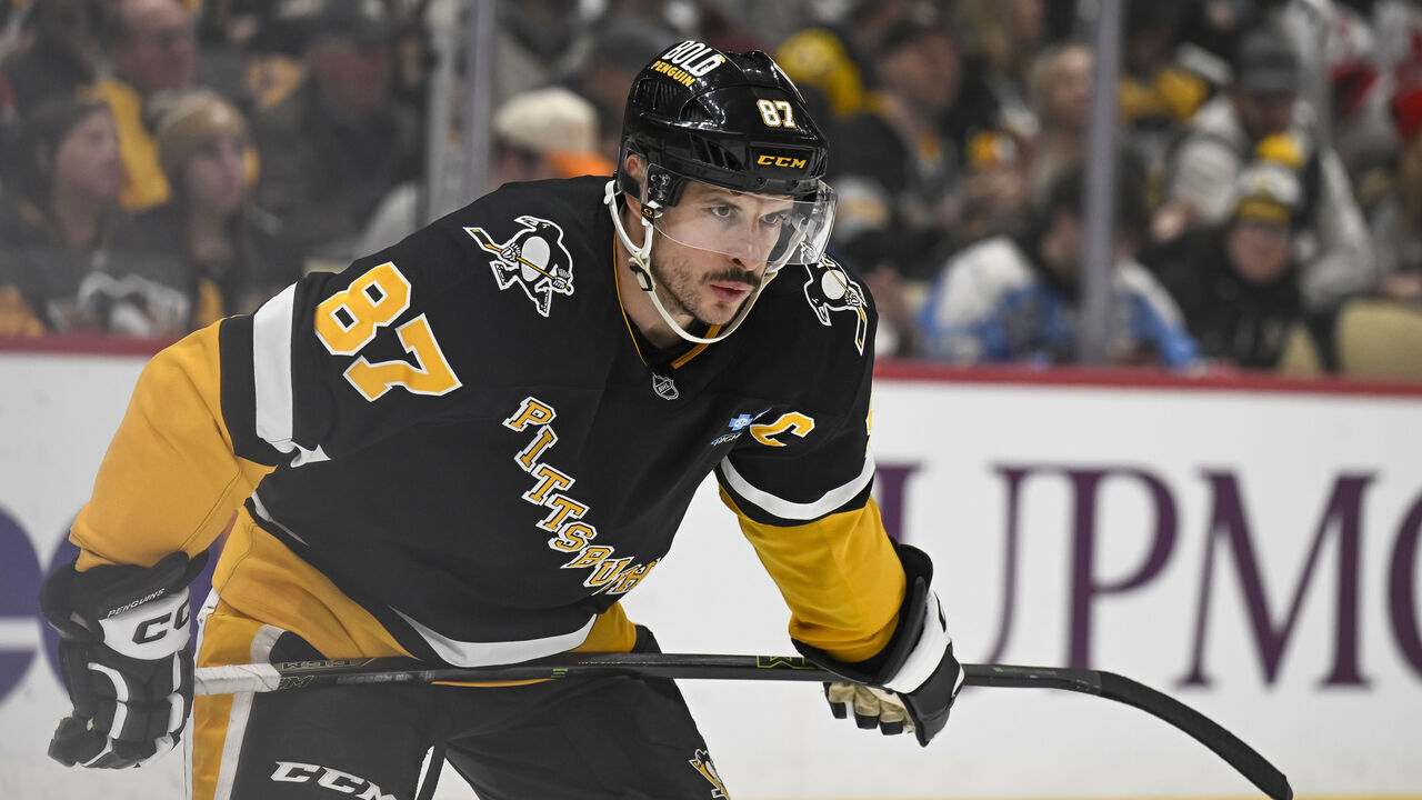 PITTSBURGH, PA - FEBRUARY 04: Pittsburgh Penguins center Sidney Crosby (87) looks on during the first period in the NHL game between the Pittsburgh Penguins and the New Jersey Devils on February 4, 2025, at PPG Paints Arena in Pittsburgh, PA.