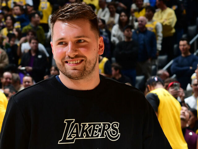 LOS ANGELES, CA - FEBRUARY 6: Luka Doncic #77 of the Los Angeles Lakers smiles before the game against the Golden State Warriors on February 6, 2025 at Crypto.Com Arena in Los Angeles, California. NOTE TO USER: User expressly acknowledges and agrees that, by downloading and/or using this Photograph, user is consenting to the terms and conditions of the Getty Images License Agreement. Mandatory Copyright Notice: Copyright 2025 NBAE