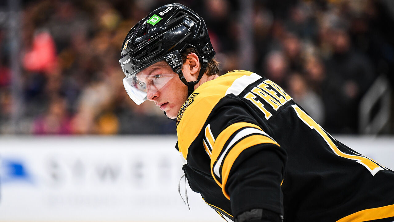 BOSTON, MASSACHUSETTS - JANUARY 14: Trent Frederic #11 of the Boston Bruins prepares for a face off during the second period against the Tampa Bay Lightning at TD Garden on January 14, 2025 in Boston, Massachusetts.