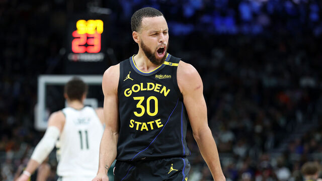 MILWAUKEE, WISCONSIN - FEBRUARY 10: Stephen Curry #30 of the Golden State Warriors reacts to a three point shot during the second half of a game against the Milwaukee Bucks at Fiserv Forum on February 10, 2025 in Milwaukee, Wisconsin.