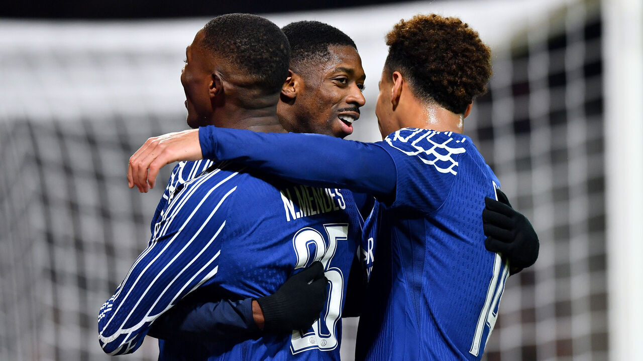 BREST, FRANCE - FEBRUARY 11: Ousmane Dembele of Paris Saint-Germain celebrates scoring his team's third goal with teammates Nuno Mendes and Desire Doue during the UEFA Champions League 2024/25 League Knockout Play-off first leg match between Stade Brestois 29 and Paris Saint-Germain at Stade de Roudourou on February 11, 2025 in Guingamp, France.