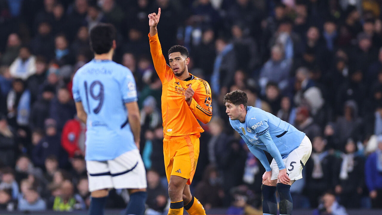 MANCHESTER, ENGLAND - FEBRUARY 11: Jude Bellingham of Real Madrid celebrates after scoring a goal to make it 2 during the UEFA Champions League 2024/25 League Knockout Play-off first leg match between Manchester City and Real Madrid C.F. at Manchester City Stadium on February 11, 2025 in Manchester, England.