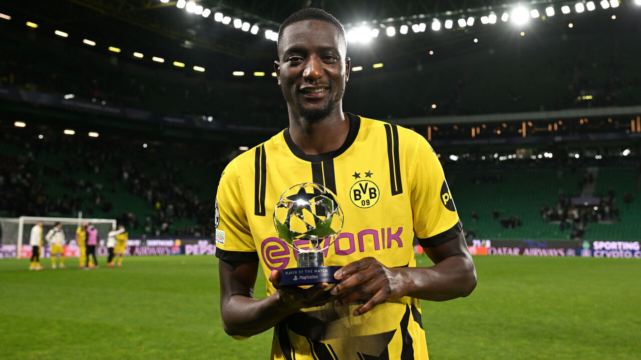 LISBON, PORTUGAL - FEBRUARY 11: Serhou Guirassy of Borussia Dortmund poses for a photo with the PlayStation Player of the Match award after the UEFA Champions League 2024/25 League Knockout Play-off First Leg match between Sporting Clube de Portugal and Borussia Dortmund at Estadio Jose Alvalade on February 11, 2025 in Lisbon, Portugal.