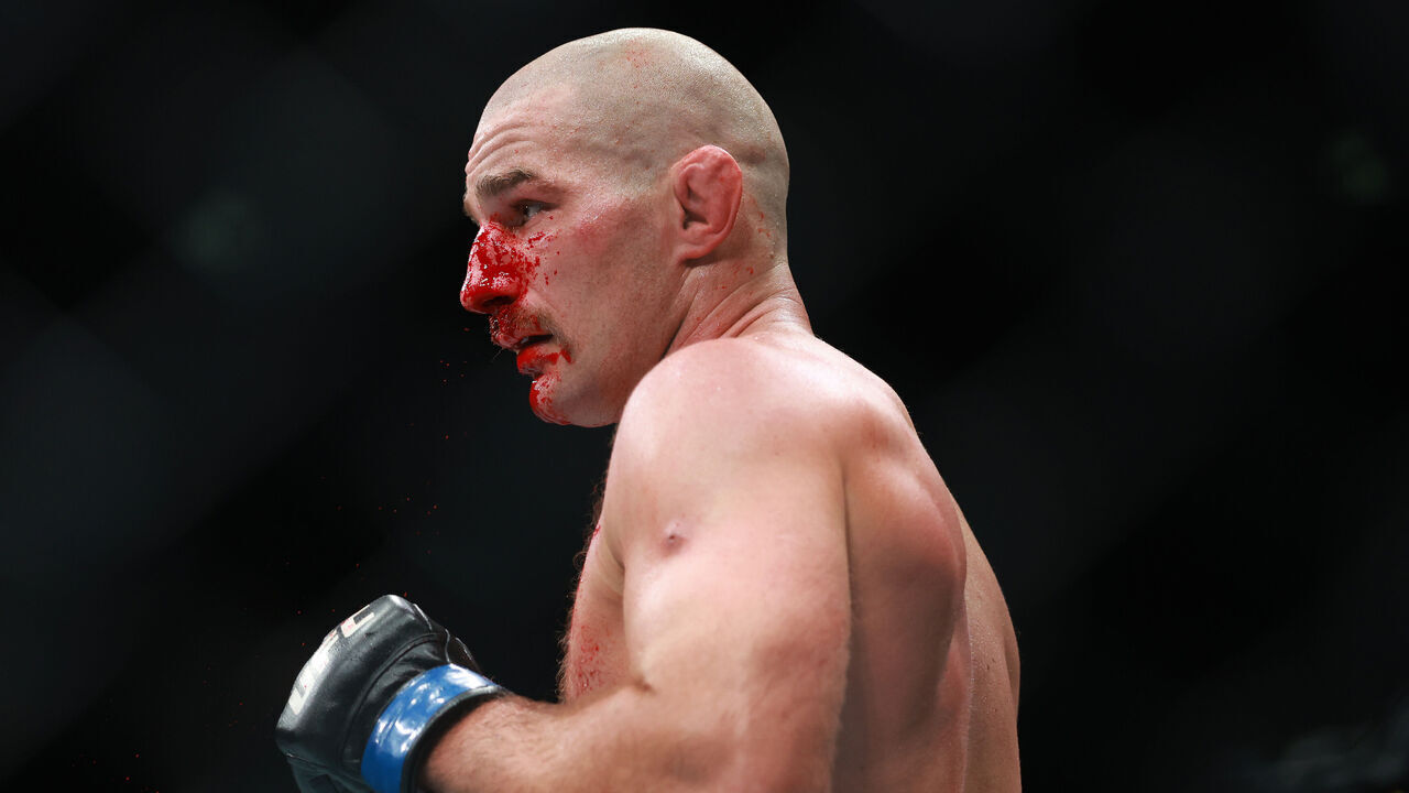 SYDNEY, AUSTRALIA - FEBRUARY 09: Sean Stricland of the United States of America and Dircus De Plessis of South Africa fight in their Middleweight Title Bout during UFC 312 at Qudos Bank Arena on February 09, 2025 in Sydney, Australia.
