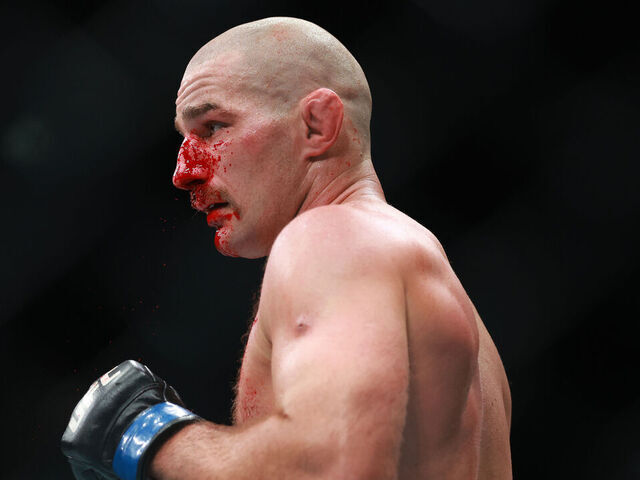 SYDNEY, AUSTRALIA - FEBRUARY 09: Sean Stricland of the United States of America and Dircus De Plessis of South Africa fight in their Middleweight Title Bout during UFC 312 at Qudos Bank Arena on February 09, 2025 in Sydney, Australia.