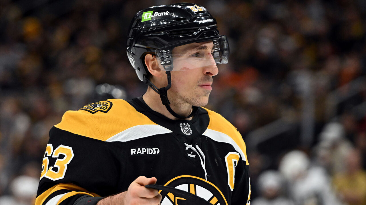 BOSTON, MASSACHUSETTS - FEBRUARY 08: Brad Marchand #63 of the Boston Bruins adjusts his stick before a face-off against the Vegas Golden Knights during the second period at the TD Garden on February 08, 2025 in Boston, Massachusetts.