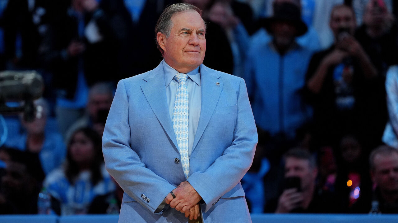 CHAPEL HILL, NORTH CAROLINA - DECEMBER 14: Head coach Bill Belichick of the North Carolina Tar Heels addresses the crowd during halftime in the game against the La Salle Explorers at the Dean E. Smith Center on December 14, 2024 in Greensboro, North Carolina.