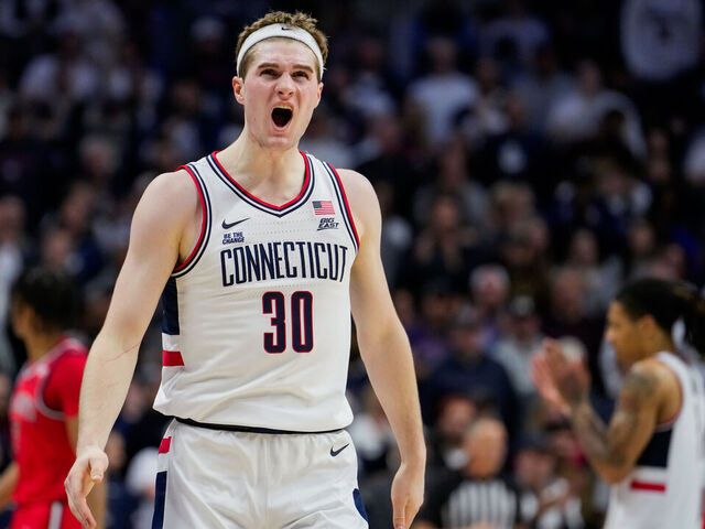 STORRS, CONNECTICUT - FEBRUARY 7: Liam McNeeley #30 of the Connecticut Huskies reacts during the second half of an NCAA basketball game against the St. John's Red Storm at the Harry A. Gampel Pavilion on February 7, 2025 in Storrs, Connecticut.