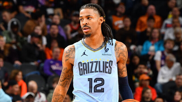 PHOENIX, AZ - FEBRUARY 11: Ja Morant #12 of the Memphis Grizzlies dribbles the ball during the game on February 11, 2025 at Footprint Center in Phoenix, Arizona. Mandatory Copyright Notice: Copyright 2025 NBAE