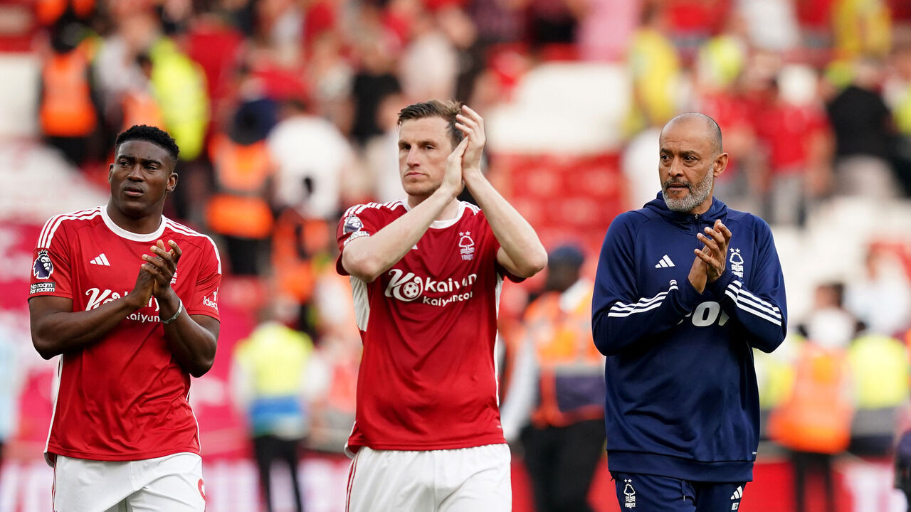Nottingham Forest manager Nuno Espirito Santo (right) walks around the pitch with Taiwo Awoniyi (left) and Chris Wood (centre) as they applaud the fans after the Premier League match at City Ground, Nottingham. Picture date: Saturday May 11, 2024.