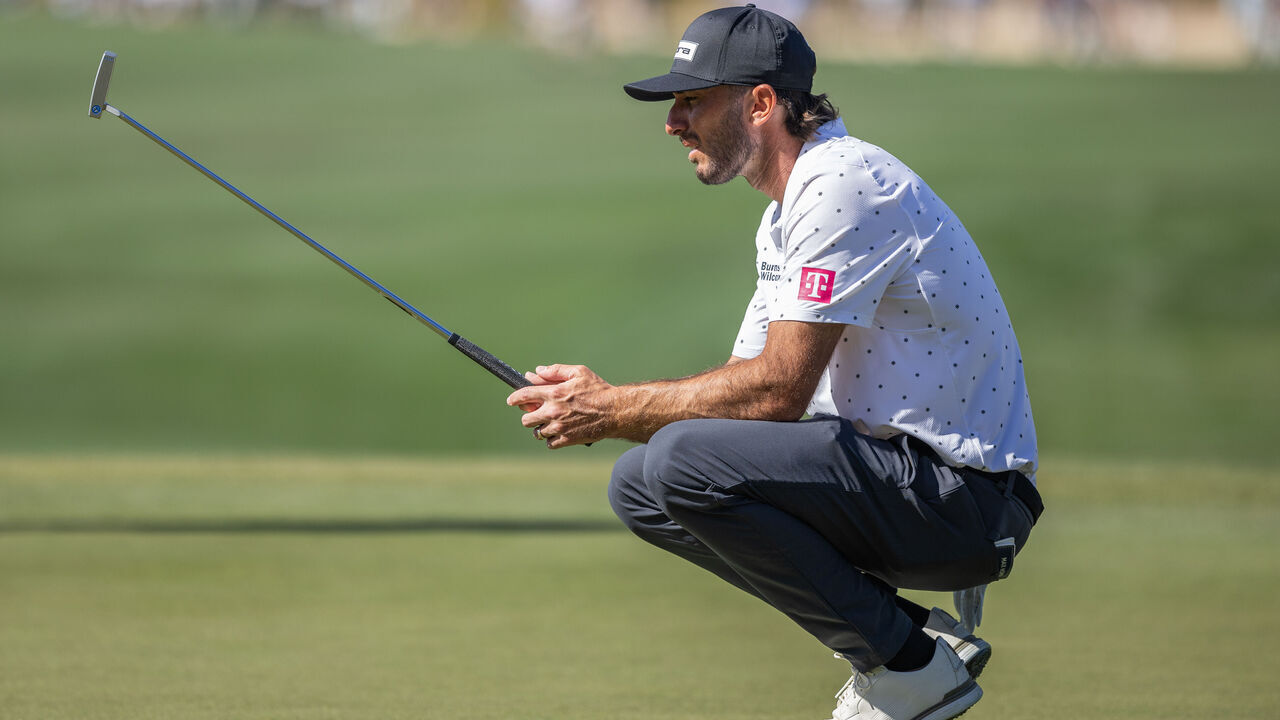SCOTTSDALE, ARIZONA - FEBRUARY 7: Max Homa lines up his putt during the second round of the WM Phoenix Open 2025 at TPC Scottsdale on February 7, 2025 in Scottsdale, Arizona.