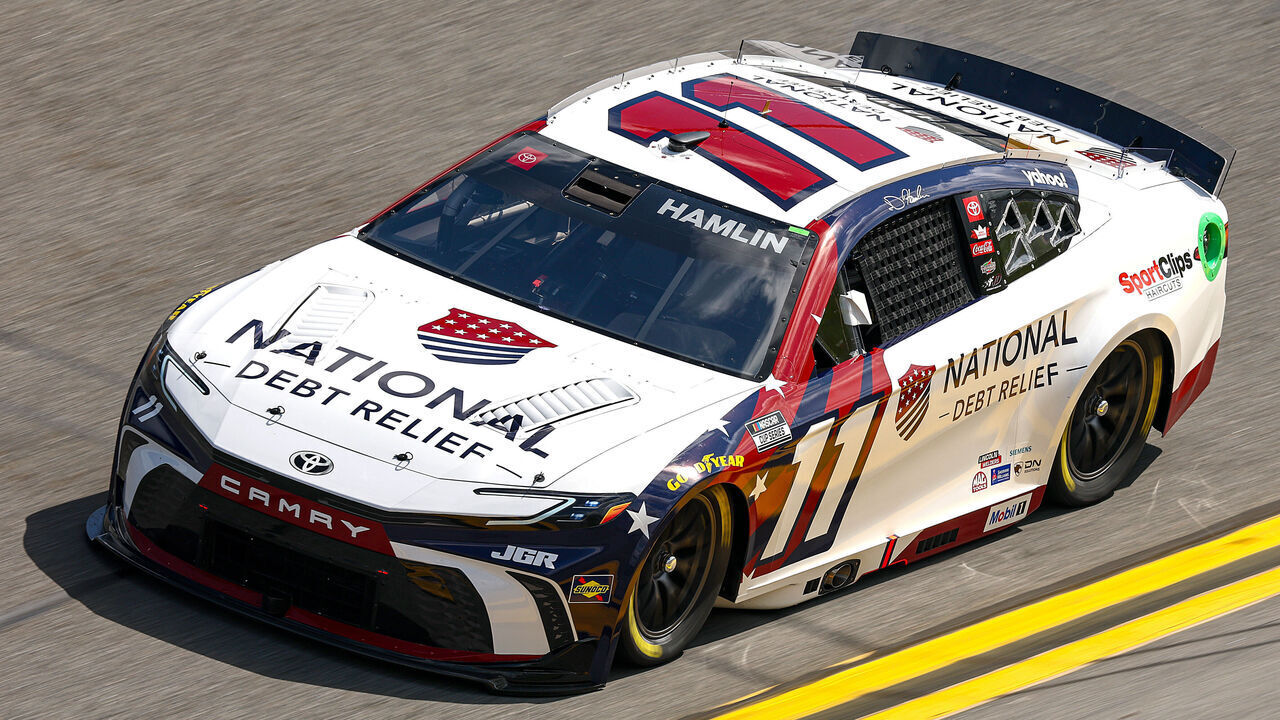 DAYTONA BEACH, FLORIDA - FEBRUARY 12: Denny Hamlin, driver of the #11 National Debt Relief Toyota drives during practice for the NASCAR Cup Series Daytona 500 at Daytona International Speedway on February 12, 2025 in Daytona Beach, Florida.