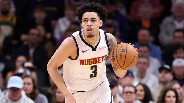 PHOENIX, ARIZONA - FEBRUARY 08: Julian Strawther #3 of the Denver Nuggets controls the ball during the game against the Phoenix Suns at Footprint Center on February 08, 2025 in Phoenix, Arizona. The Nuggets defeated the Suns 122-105.