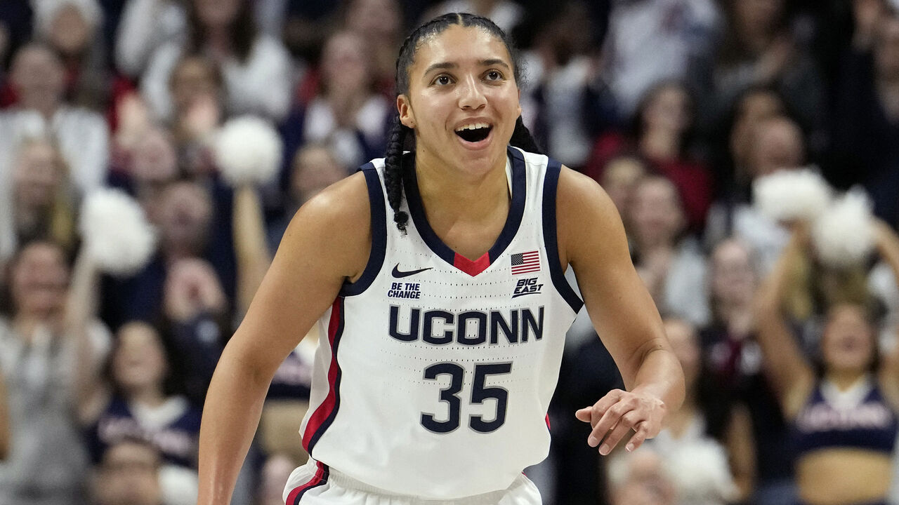 STORRS, CONNECTICUT - FEBRUARY 12: Aubrey Griffin #44 and Azzi Fudd #35 of the Connecticut Huskies react during the second half against the St. John's Red Storm at the Harry A. Gampel Pavilion on February 12, 2025 in Storrs, Connecticut. The Huskies defeated the Red Storm 78-40.
