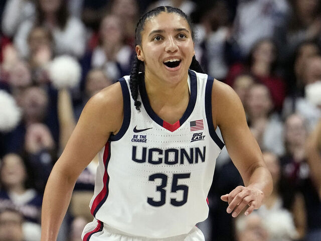 STORRS, CONNECTICUT - FEBRUARY 12: Aubrey Griffin #44 and Azzi Fudd #35 of the Connecticut Huskies react during the second half against the St. John's Red Storm at the Harry A. Gampel Pavilion on February 12, 2025 in Storrs, Connecticut. The Huskies defeated the Red Storm 78-40.