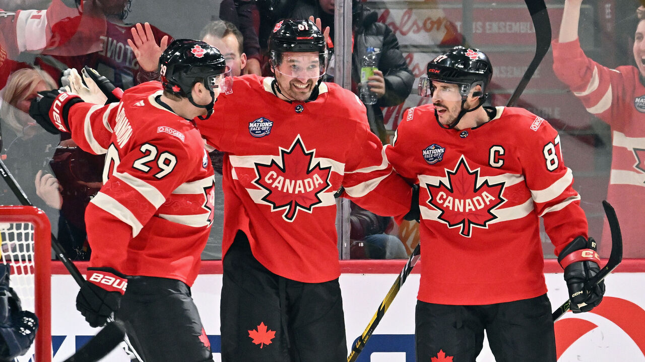 MONTREAL, CANADA - FEBRUARY 12: Mark Stone #61 of Team Canada (c) celebrates his goal against Team Sweden at 17:28 of the second period and is joined by Nathan MacKinnon #29 (l) and Sidney Crosby #87 (r) in the NHL 4 Nations Face-Off at Bell Centre on February 12, 2025 in Montreal, Quebec, Canada.