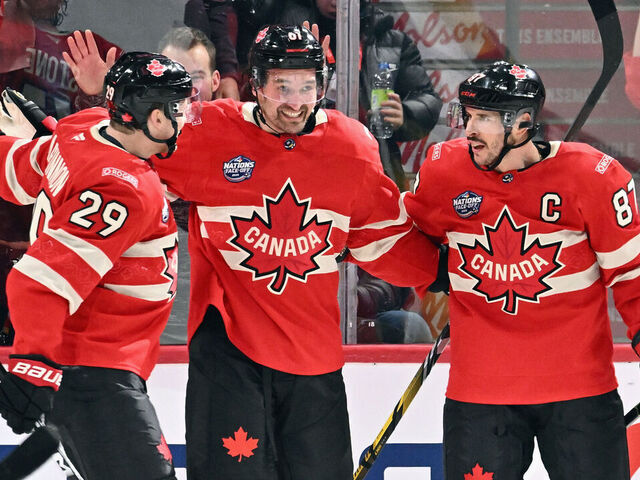 MONTREAL, CANADA - FEBRUARY 12: Mark Stone #61 of Team Canada (c) celebrates his goal against Team Sweden at 17:28 of the second period and is joined by Nathan MacKinnon #29 (l) and Sidney Crosby #87 (r) in the NHL 4 Nations Face-Off at Bell Centre on February 12, 2025 in Montreal, Quebec, Canada.