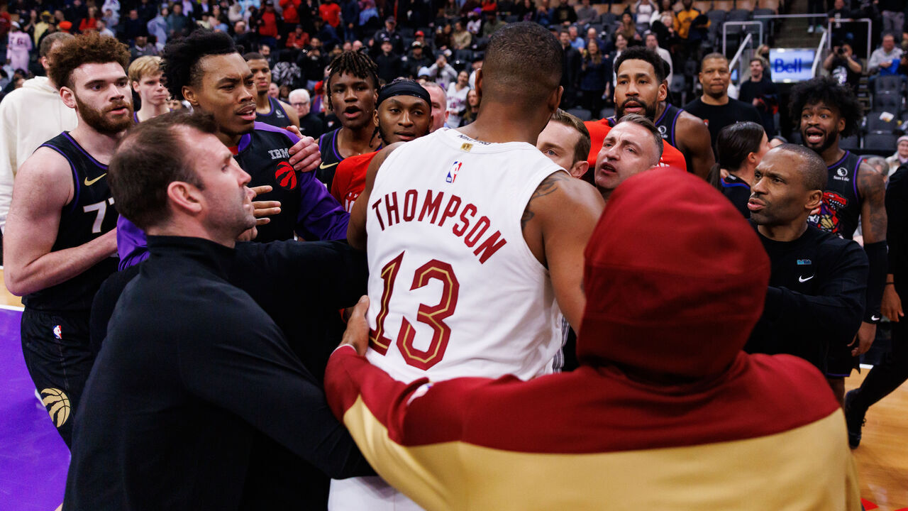 TORONTO, CANADA - FEBRUARY 12: Tristan Thompson #13 of the Cleveland Cavaliers gets into a scuffle with players of the Toronto Raptors at the end of their NBA game at Scotiabank Arena on February 12, 2025 in Toronto, Canada.