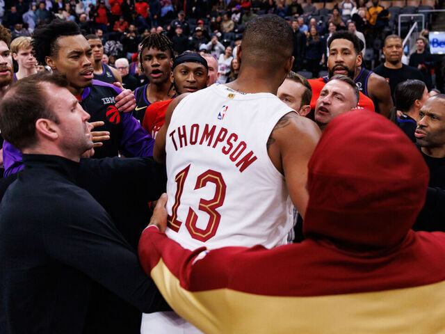 TORONTO, CANADA - FEBRUARY 12: Tristan Thompson #13 of the Cleveland Cavaliers gets into a scuffle with players of the Toronto Raptors at the end of their NBA game at Scotiabank Arena on February 12, 2025 in Toronto, Canada.