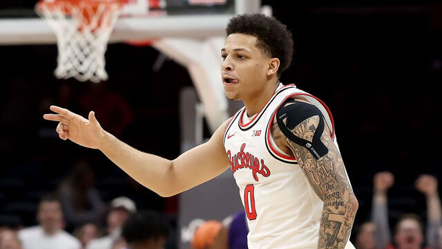 COLUMBUS, OHIO - FEBRUARY 12: John Mobley Jr. #0 of the Ohio State Buckeyes reacts after making a three-point shot during the first half against the Washington Huskies at Value City Arena on February 12, 2025 in Columbus, Ohio.