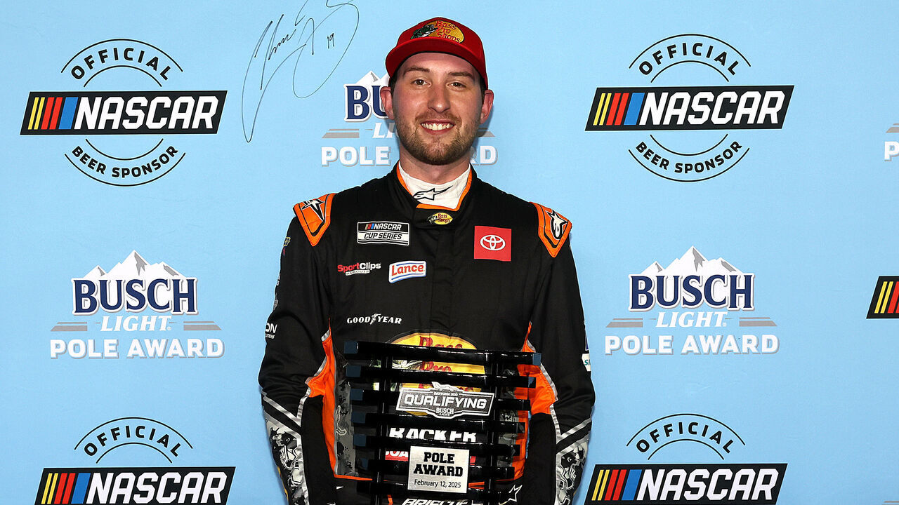 DAYTONA BEACH, FLORIDA - FEBRUARY 12: Chase Briscoe, driver of the #19 Bass Pro Shops Toyota poses with the Pole Award trophy after qualifying for the NASCAR Cup Series Daytona 500 at Daytona International Speedway on February 12, 2025 in Daytona Beach, Florida.