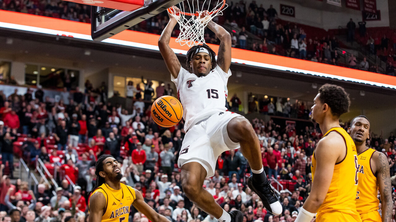 LUBBOCK, TEXAS - FEBRUARY 12: JT Toppin #15 of the Texas Tech Red Raiders dunks the ball during overtime of the game against the Arizona State Sun Devils at United Supermarkets Arena on February 12, 2025 in Lubbock, Texas.