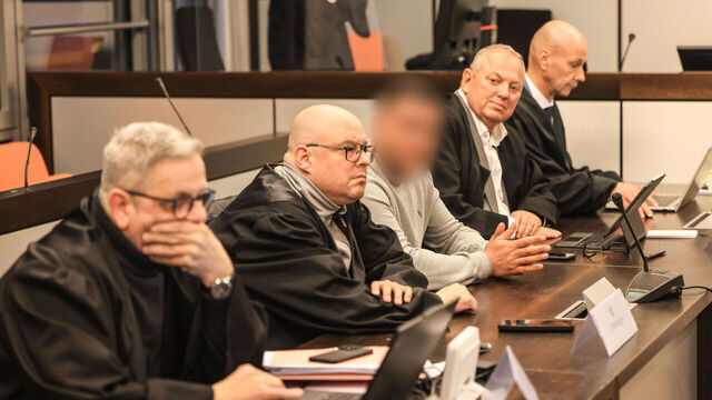 12 February 2025, North Rhine-Westphalia, Wuppertal: One of the three defendants (M) sits between lawyers in the courtroom of the district court before the verdict is announced. For the failed extortion of the family of ex-Formula 1 racing driver Michael Schumacher, the judiciary has sentenced three defendants to up to three years in prison. Photo: Oliver Berg/dpa - ATTENTION: Person(s) has/have been pixelated for legal reasons