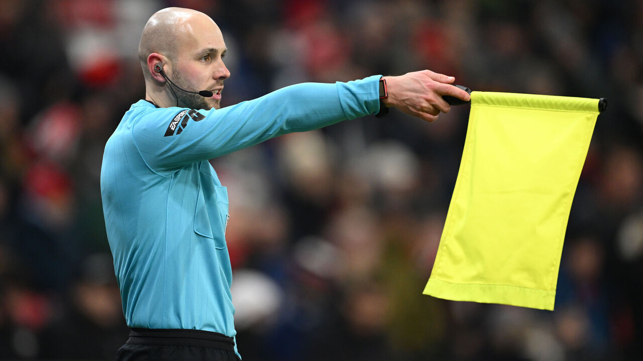 SUNDERLAND, ENGLAND - JANUARY 11: Referee's assistant Nigel Lugg flags for offside during the Emirates FA Cup Third Round match between Sunderland and Stoke City at Stadium of Light on January 11, 2025 in Sunderland, England.