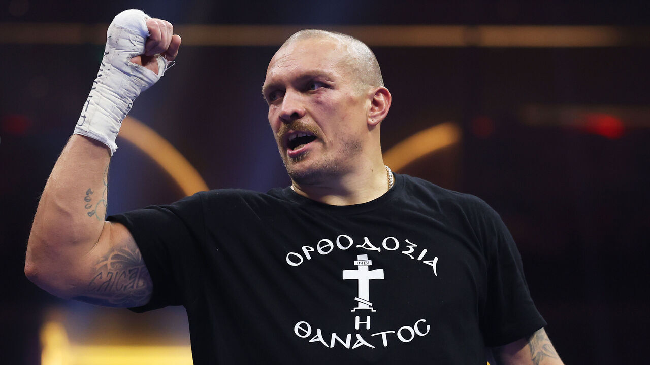 RIYADH, SAUDI ARABIA - DECEMBER 21: Oleksandr Usyk celebrates victory following the IBF, IBO, WBA, WBC and WBO Undisputed World Heavyweight titles' fight between Oleksandr Usyk and Tyson Fury as part of Oleksandr Usyk v Tyson Fury 2, Reignited card at Kingdom Arena on December 21, 2024 in Riyadh, Saudi Arabia.