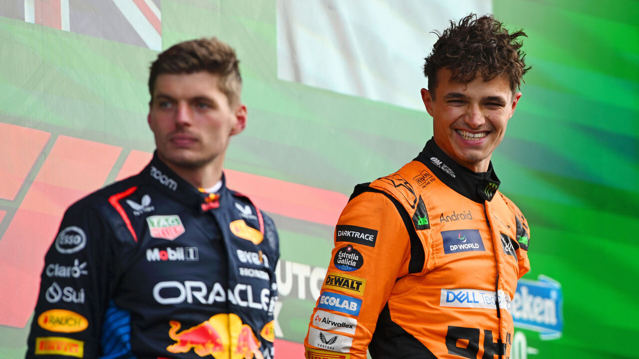 ZANDVOORT, NETHERLANDS - AUGUST 25: Race winner Lando Norris of Great Britain and McLaren and second placed Max Verstappen of the Netherlands and Oracle Red Bull Racing celebrate in parc ferme after the F1 Grand Prix of Netherlands at Circuit Zandvoort on August 25, 2024 in Zandvoort, Netherlands.
