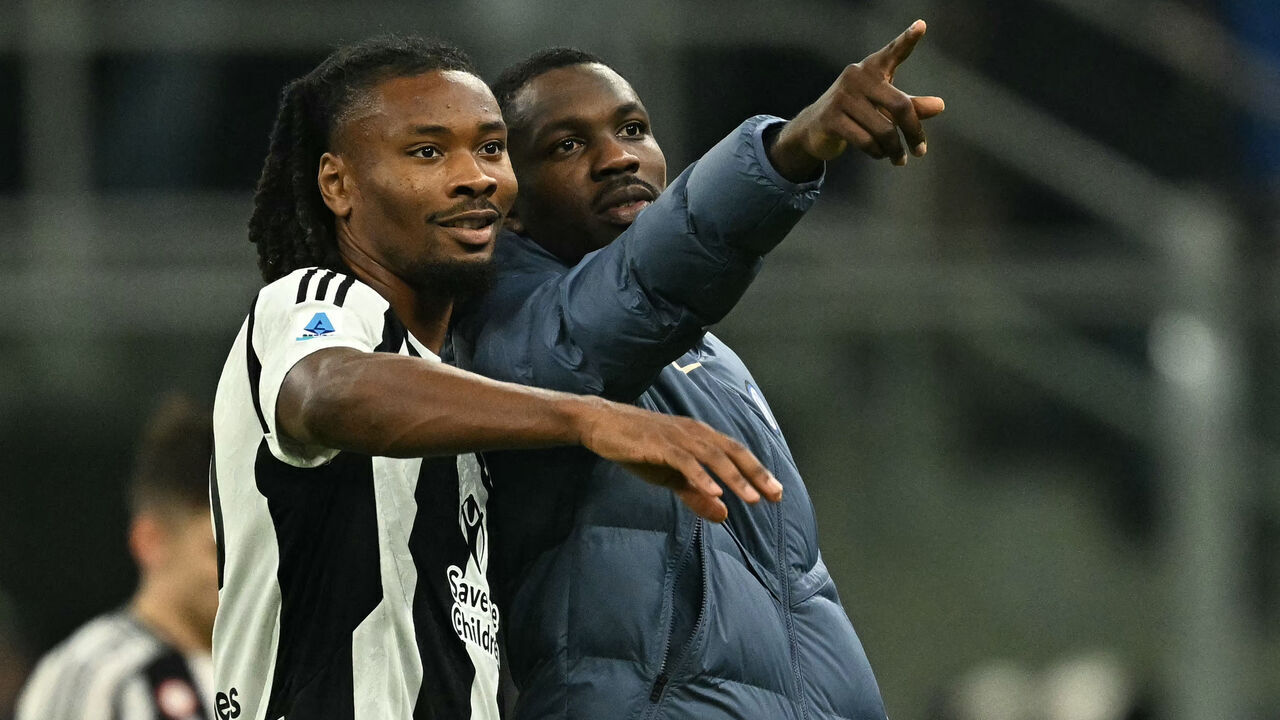 Juventus' French midfielder #19 Khephren Thuram-Ulien (L) and his brother Inter Milan's French forward #09 Marcus Thuram are pictured at the end of the Italian Serie A football match between Inter Milan and Juventus at San Siro stadium in Milan, on October 27, 2024.