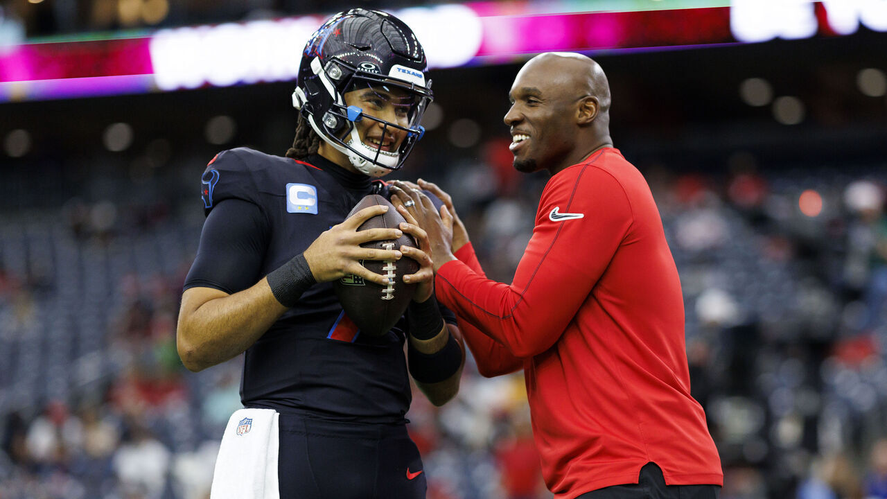 HOUSTON, TEXAS - DECEMBER 25: Quarterback C.J. Stroud #7 of the Houston Texans stands on the field with head coach DeMeco Ryans prior to an NFL football game against the Baltimore Ravens, at NRG Stadium on December 25, 2024 in Houston, Texas.