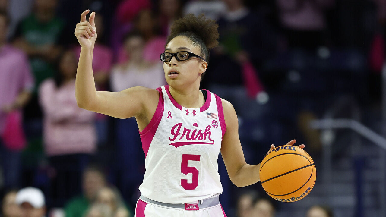 SOUTH BEND, IN - FEBRUARY 09: Notre Dame Fighting Irish guard Olivia Miles (5) calls out a play during a women's college basketball game between the California Golden Bears and the Notre Dame Fighting Irish on February 09, 2025 at Purcell Pavilion in South Bend, IN.
