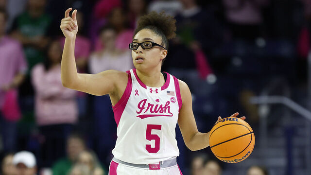 SOUTH BEND, IN - FEBRUARY 09: Notre Dame Fighting Irish guard Olivia Miles (5) calls out a play during a women's college basketball game between the California Golden Bears and the Notre Dame Fighting Irish on February 09, 2025 at Purcell Pavilion in South Bend, IN.