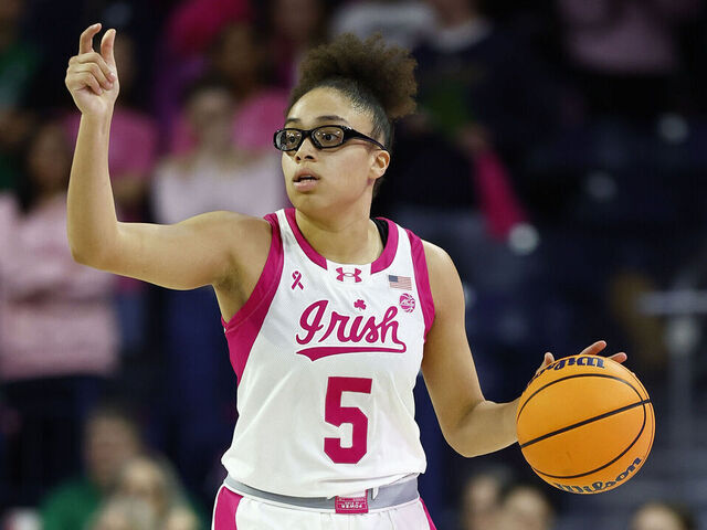SOUTH BEND, IN - FEBRUARY 09: Notre Dame Fighting Irish guard Olivia Miles (5) calls out a play during a women's college basketball game between the California Golden Bears and the Notre Dame Fighting Irish on February 09, 2025 at Purcell Pavilion in South Bend, IN.